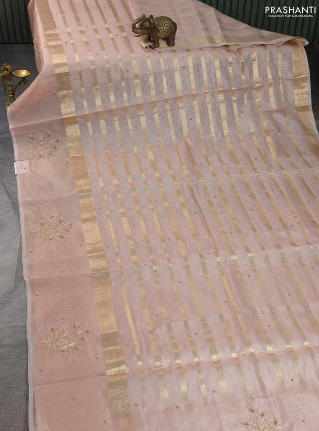 Kota tissue saree pastel pink with allover zari weaves & embroidery buttas and embroidery butta border