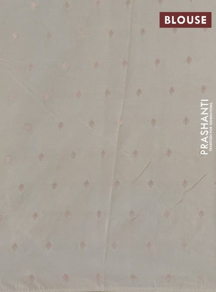 Kota tissue saree sandal with allover zari weaves & embroidery buttas and embroidery butta border