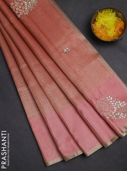 Kota tissue saree peach shade with allover zari weaves embroidery buttas and embroidery butta border