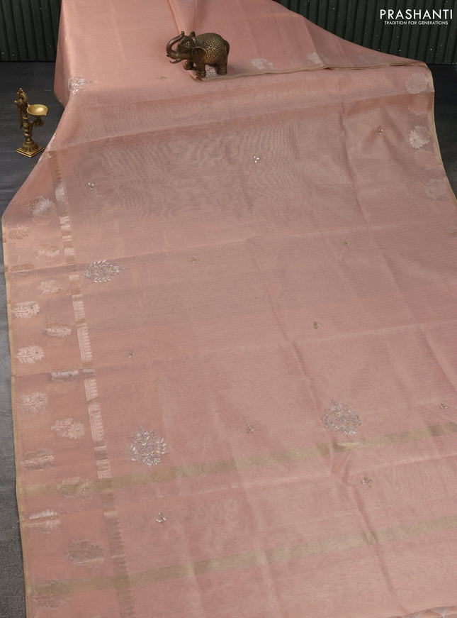 Kota tissue saree peach with embroidery buttas and zari woven butta border