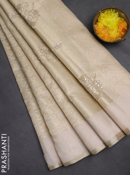 Kota tissue saree beige with allover zari weaves and embroidered butta boder