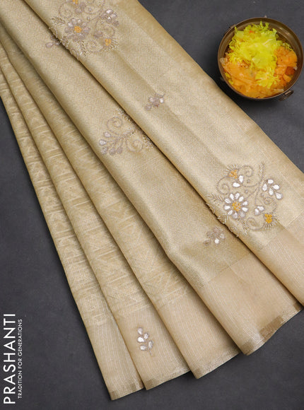 Kota tissue saree sandal with allover zari weaves and embroidered butta boder