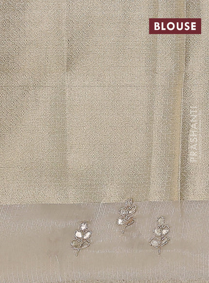 Kota tissue saree sandal with allover zari weaves and embroidered butta boder