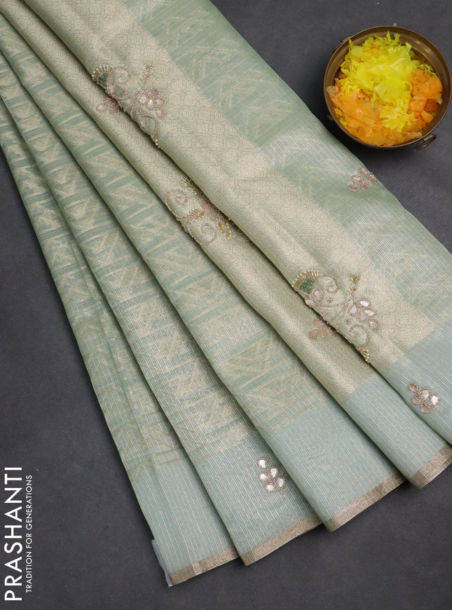 Kota tissue saree teal blue with allover zari weaves and embroidered butta boder