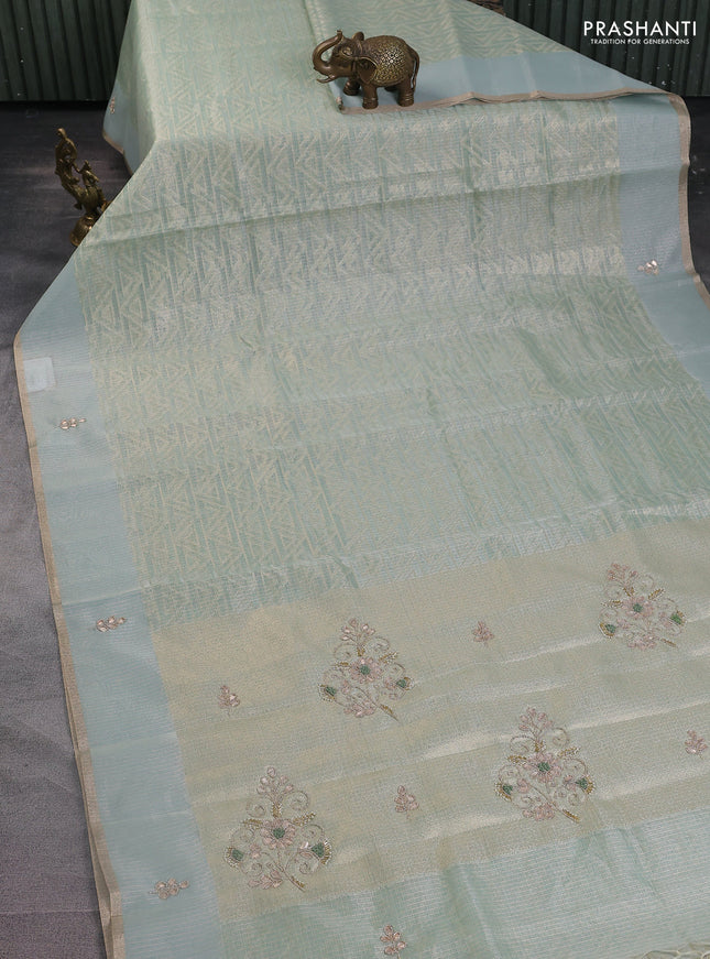 Kota tissue saree teal blue with allover zari weaves and embroidered butta boder
