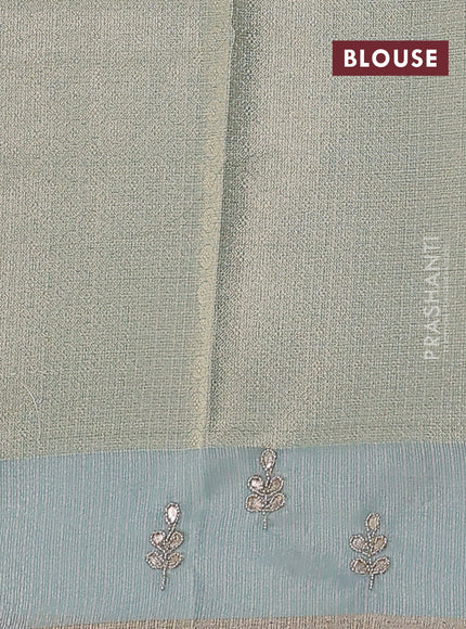 Kota tissue saree teal blue with allover zari weaves and embroidered butta boder