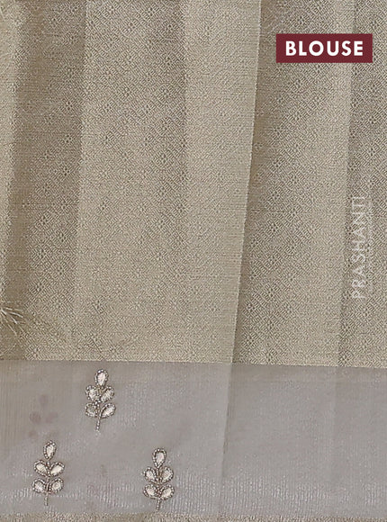 Kota tissue saree beige with allover zari weaves and embroidered butta boder