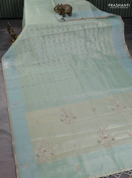 Kota tissue saree teal blue with allover zari weaves and embroidered butta boder