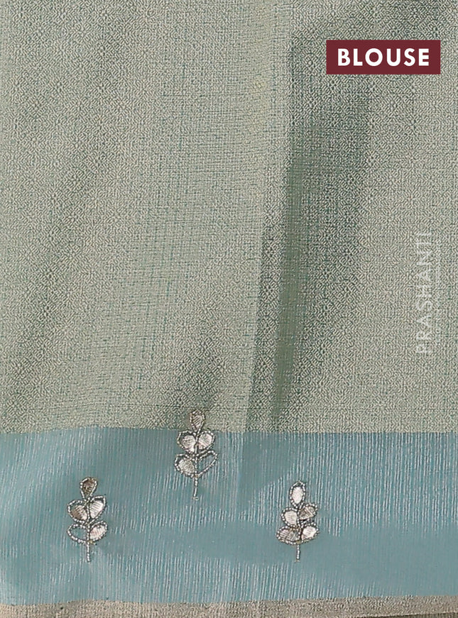 Kota tissue saree teal blue with allover zari weaves and embroidered butta boder