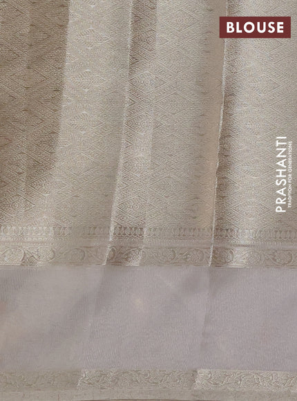 Kota tissue saree beige with zari woven buttas and embroidered butta boder