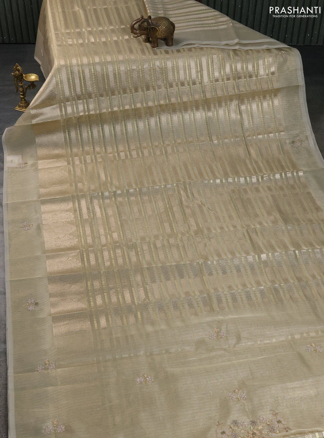 Kota tissue saree mild pista with allover zari weaves and zari woven embroidered butta boder