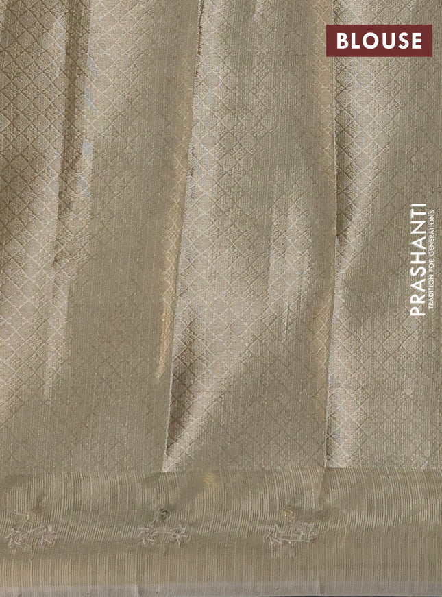 Kota tissue saree mild pista with allover zari weaves and zari woven embroidered butta boder
