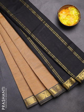 Silk cotton saree sandal and black with plain body and zari woven border