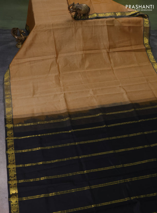Silk cotton saree sandal and black with plain body and zari woven border