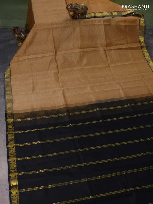 Silk cotton saree sandal and black with plain body and zari woven border