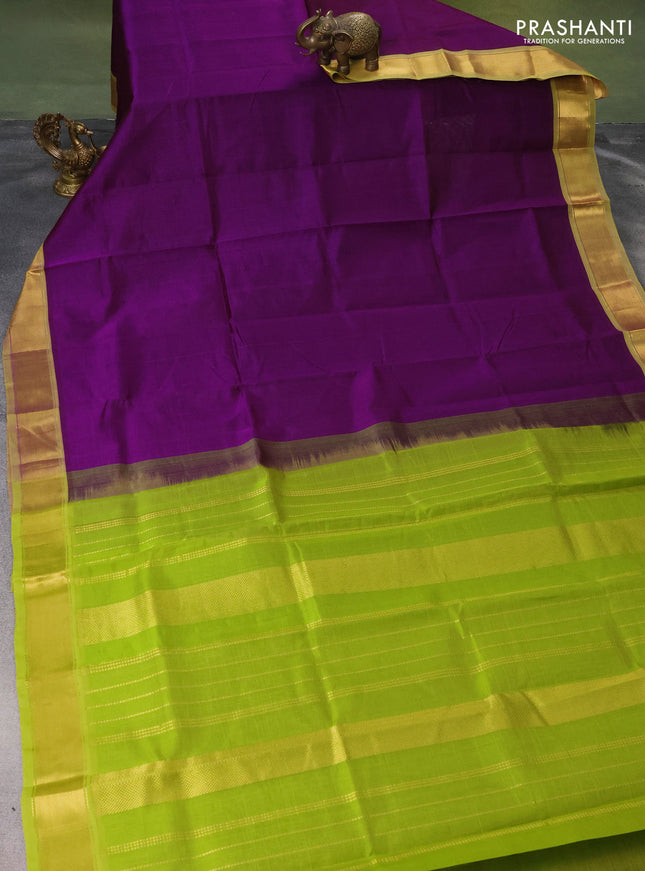 Silk cotton saree violet and light green with plain body and zari woven border