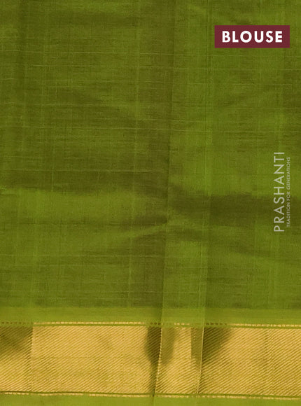 Silk cotton saree violet and light green with plain body and zari woven border