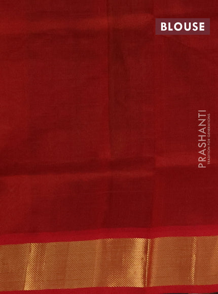 Silk cotton saree green and maroon with plain body and zari woven border