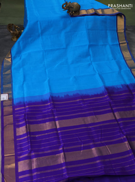 Silk cotton saree light blue and blue with plain body and zari woven border
