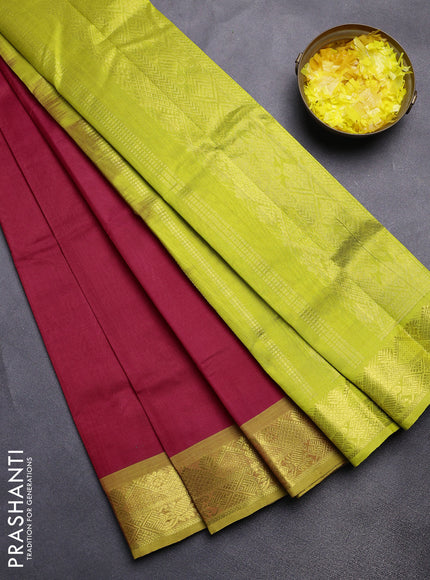 Silk cotton saree red and light green with plain body and zari woven border