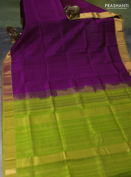 Silk cotton saree purple and light green with plain body and zari woven border