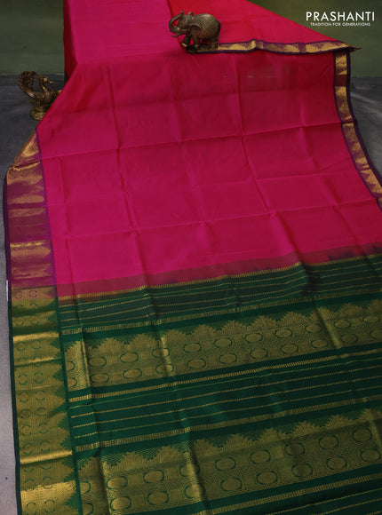 Silk cotton saree pink and green with plain body and zari woven border