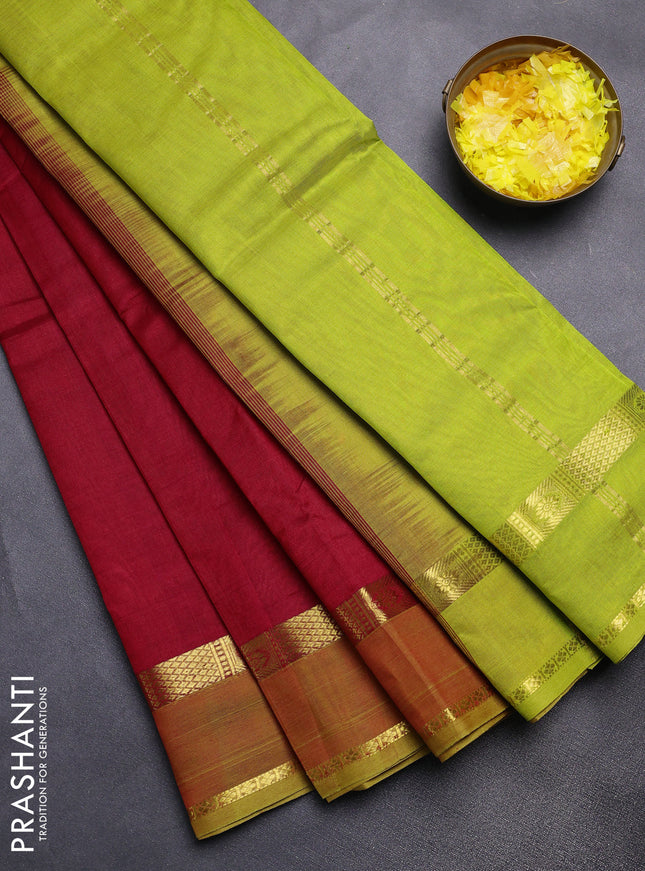 Silk cotton saree maroon and light green with plain body and rettapet zari woven border