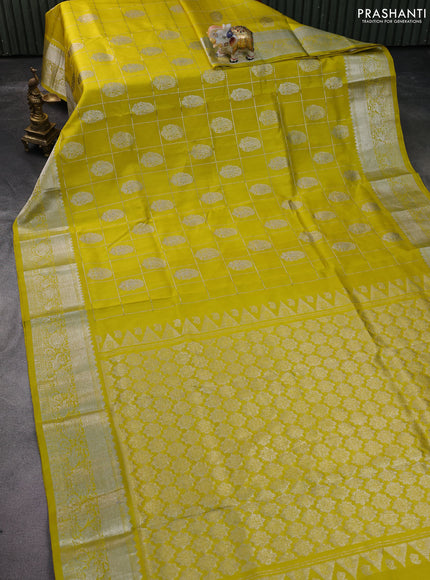 Venkatagiri silk saree lime yellow with silver zari checks & buttas and silver zari woven border