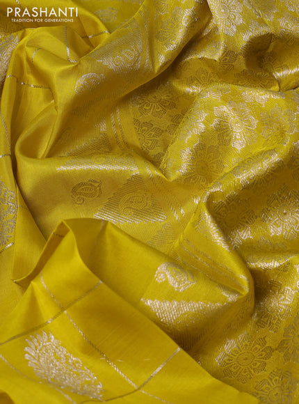 Venkatagiri silk saree lime yellow with silver zari checks & buttas and silver zari woven border