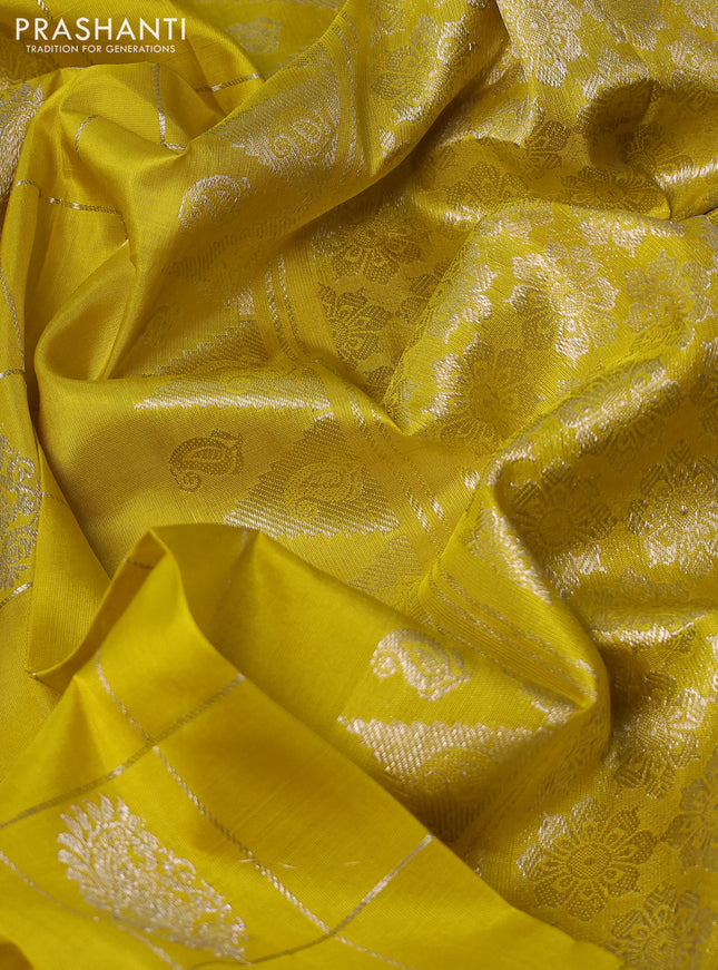 Venkatagiri silk saree lime yellow with silver zari checks & buttas and silver zari woven border