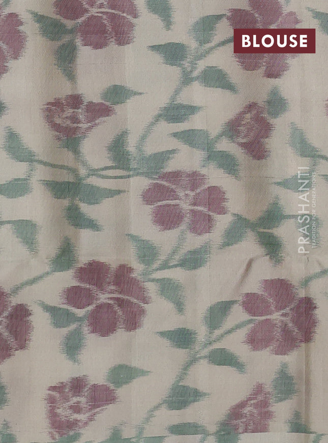 Ikat soft silk saree Dark green and beige with zari woven buttas and ikat style border