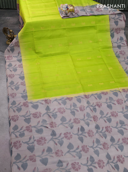 Ikat soft silk saree fluorescent green and grey with zari woven buttas and ikat style border