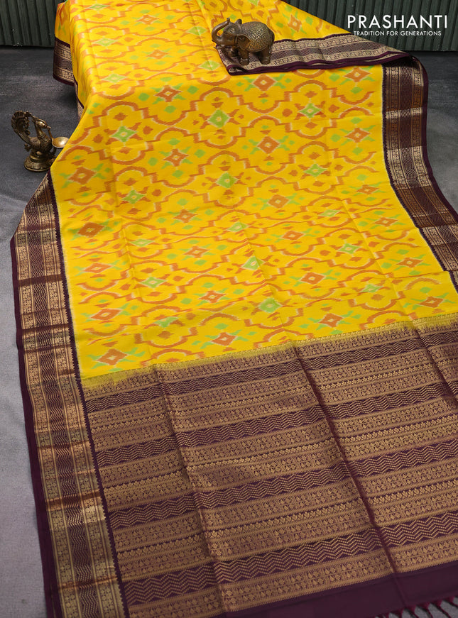 Ikat soft silk saree yellow and deep wine shade with allover ikat weaves and zari woven border