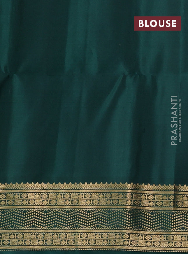 Ikat soft silk saree deep purple and green with allover ikat weaves and zari woven border