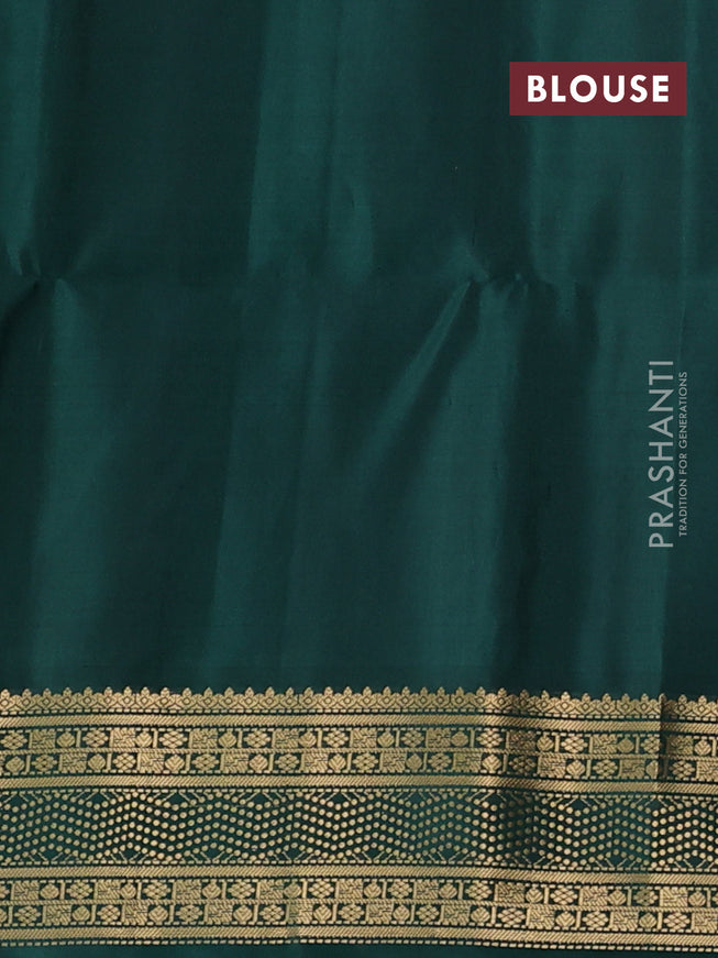 Ikat soft silk saree deep purple and green with allover ikat weaves and zari woven border