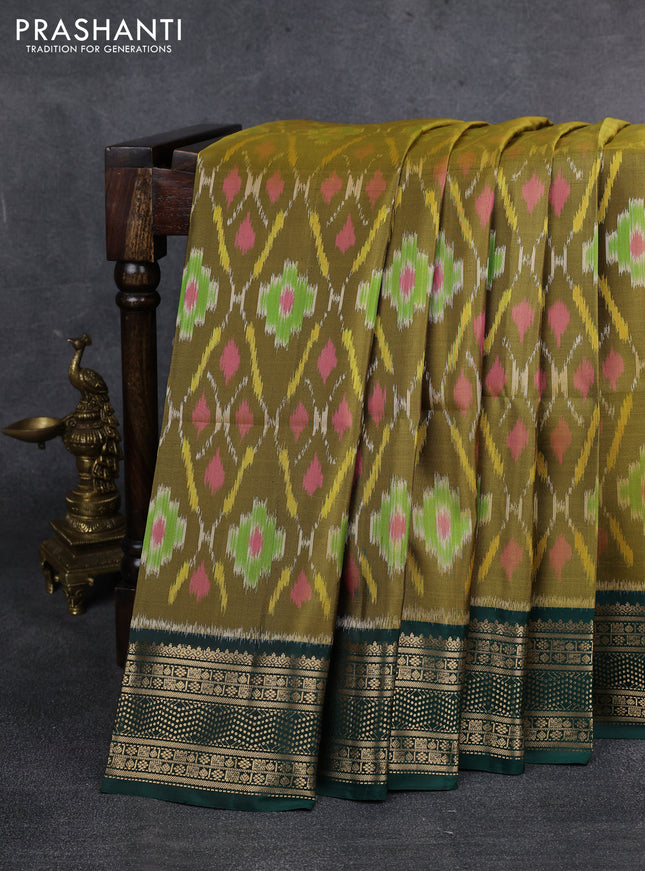 Ikat soft silk saree mehendi green and green with allover ikat weaves and zari woven border