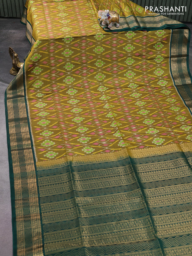 Ikat soft silk saree mehendi green and green with allover ikat weaves and zari woven border