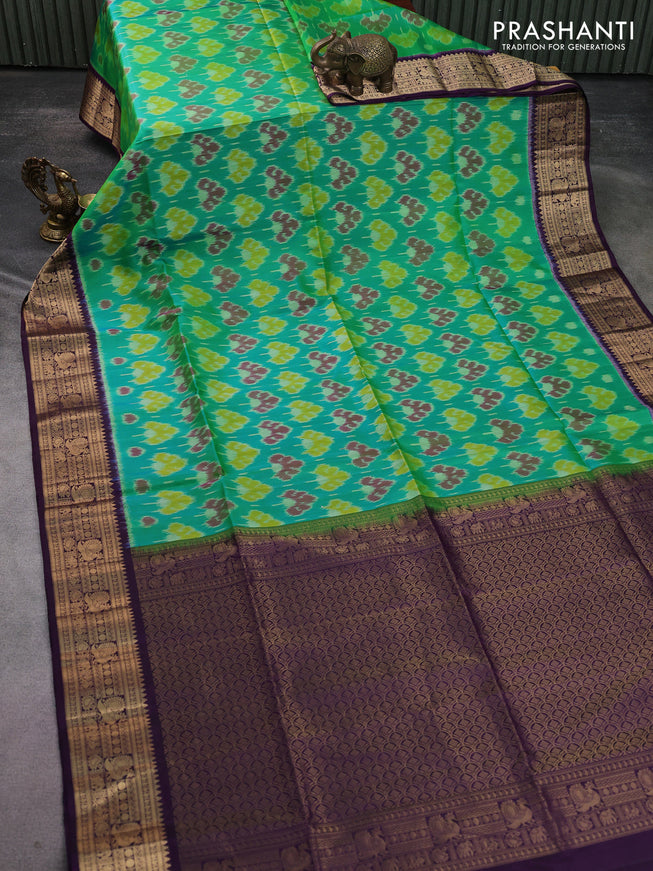 Ikat soft silk saree teal green and deep violet with allover ikat weaves and zari woven border