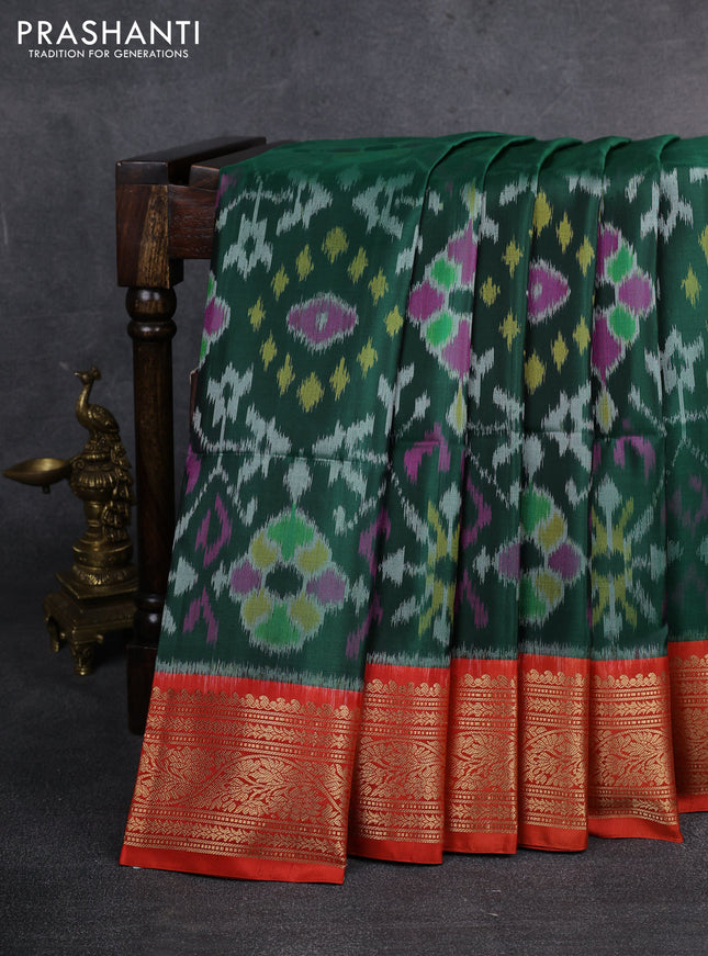 Ikat soft silk saree dark green and orange with allover ikat weaves and zari woven border