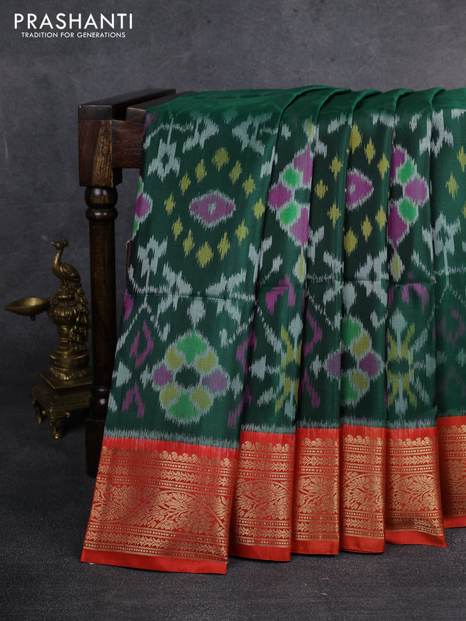 Ikat soft silk saree dark green and orange with allover ikat weaves and zari woven border