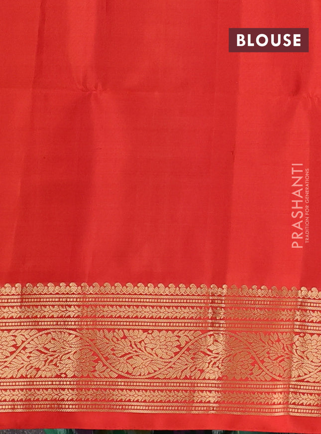 Ikat soft silk saree dark green and orange with allover ikat weaves and zari woven border