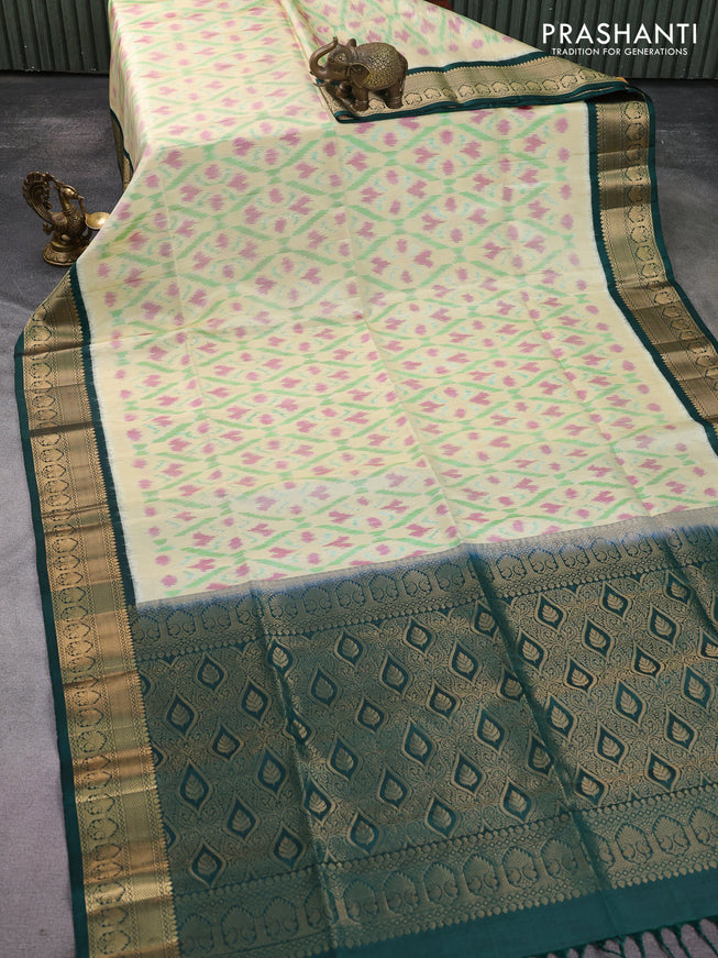 Ikat soft silk saree cream and dark green with allover ikat weaves and zari woven border