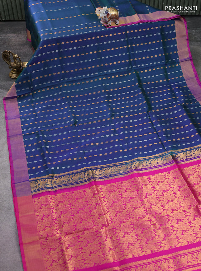 Pure uppada silk saree dual shade of bluish green with allover silver & gold zari weaves and zari woven border