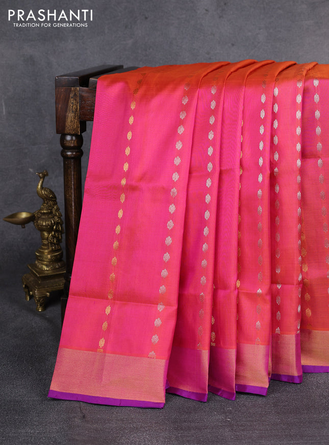Pure uppada silk saree dual shade of pinkish orange and blue with allover silver & gold zari weaves and zari woven border