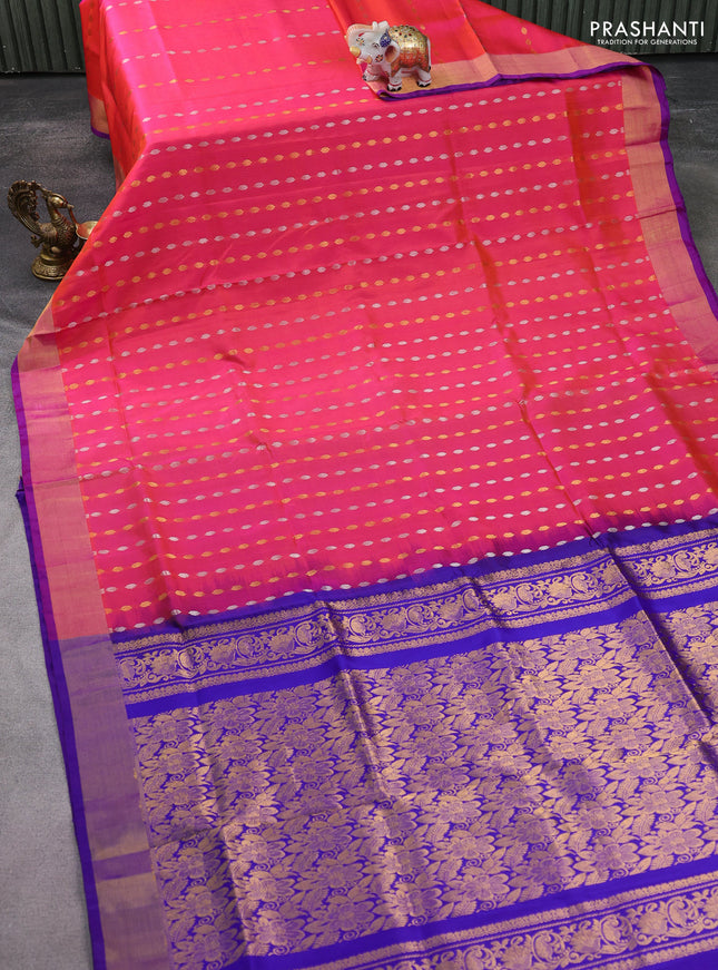 Pure uppada silk saree dual shade of pinkish orange and blue with allover silver & gold zari weaves and zari woven border