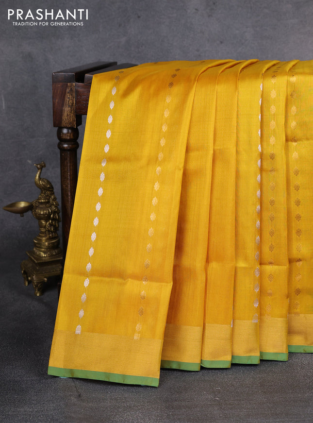 Pure uppada silk saree mustard yellow and green with allover silver & gold zari weaves and zari woven border