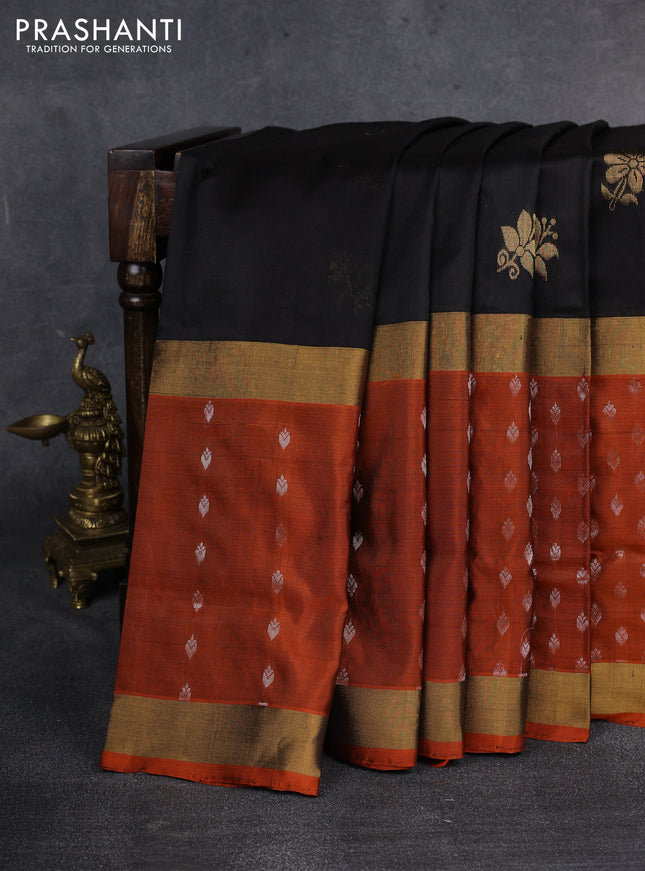 Pure uppada silk saree black and rustic orange with zari woven buttas and long zari woven butta border
