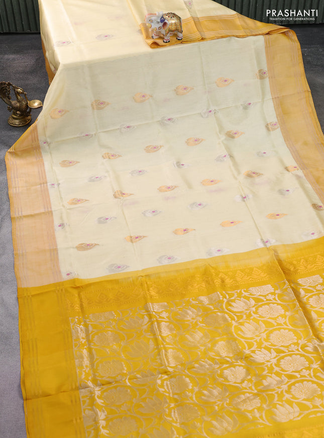 Pure uppada silk saree cream and mustard yellow with silver & gold zari woven buttas and rettapet zari woven border
