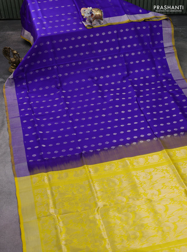 Pure uppada silk saree blue and yellow with silver zari woven floral buttas and silver zari woven border