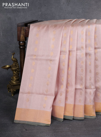 Pure uppada silk saree pastel peach and sap green with allover zari woven butta weaves and zari woven border